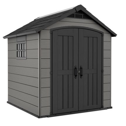 Vue générale de l'abri DOMUS installé dans un jardin avec portes fermées et finition gris effet bois