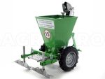 Machine en action sur le terrain avec fermeture du sillon visible